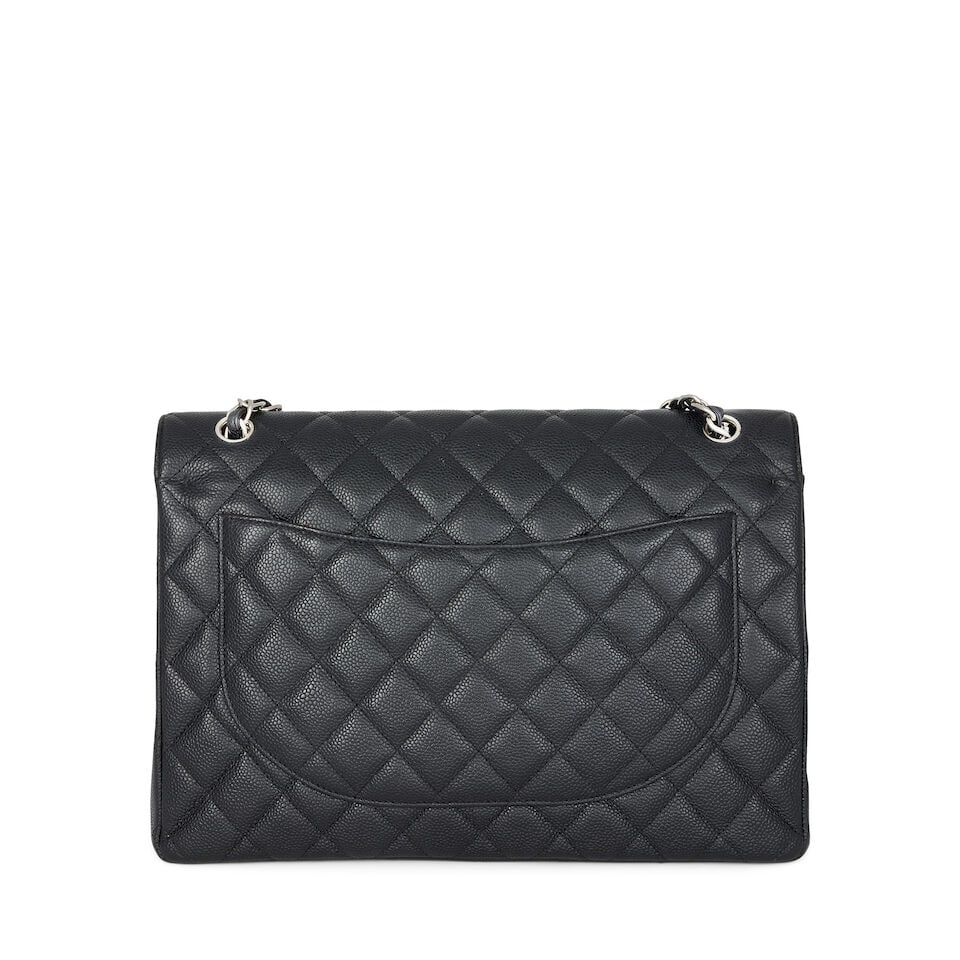 Chanel: a Black Caviar Leather Maxi Flap Bag 2011-12 (includes serial sticker and authenticity c... - 2