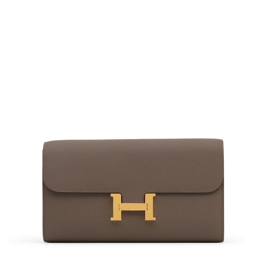 Hermès: a Gris Etain Epsom Leather Constance To Go 2025 (includes shoulder strap, protectiv...: Hermès: a Gris Etain Epsom Leather Constance To Go 2025 Gold tone hardware Condition Grade A 20.5cm wide, 11.5cm high, 4cm deep, 40cm shoulder drop, includes shoulder strap, protective felt, dust