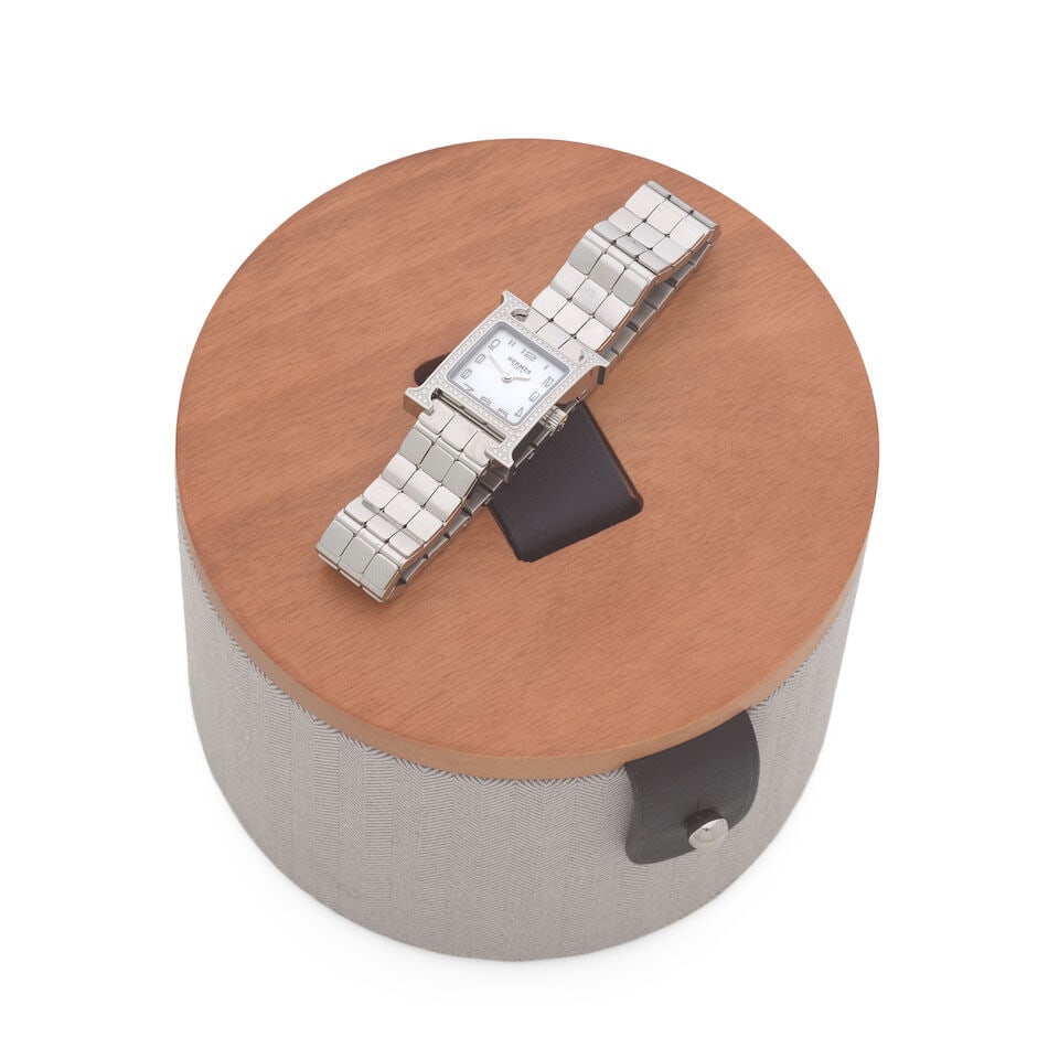 Hermès: a Diamond-Set Stainless Steel Heure H Bracelet Watch Mini model (Ref: 1.131), purch... - 2