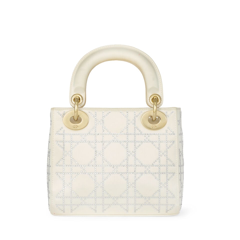Christian Dior: a Pearl White Satin Mini Lady Dior Bag 2011 (includes authenticity card, booklet... - 2