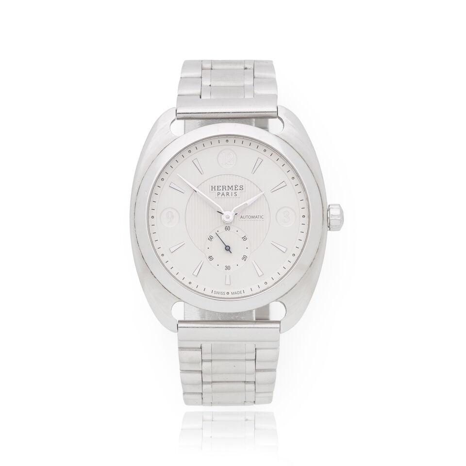 Hermès: a Stainless Steel Dressage Automatic Bracelet Watch Ref: DR5.71B (includes a signed...: Hermès: a Stainless Steel Dressage Automatic Bracelet Watch Ref: DR5.71B Silver dial Condition Grade B- Case 40mm, includes a signed folding clip and dust bag For further information on this lot 