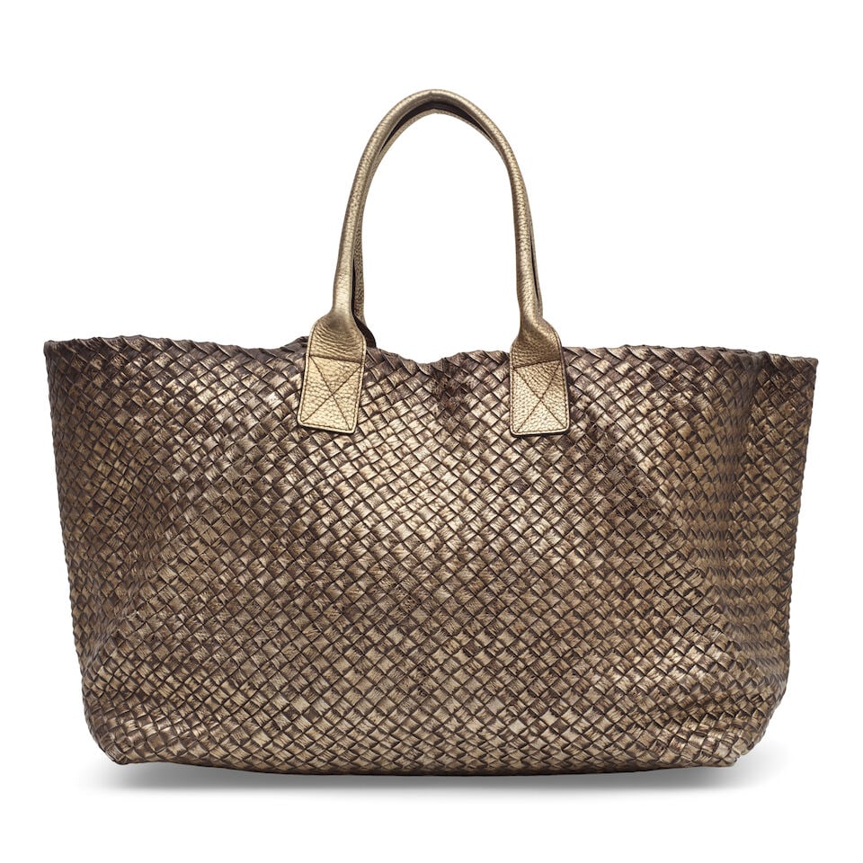 Bottega Veneta: a Large Gold Intrecciato Cabat Tote (includes detachable gold leather pouch and ...: Bottega Veneta: a Large Gold Intrecciato Cabat Tote Woven metallic gold Nappa leather Condition Grade B 62cm wide, 28cm high, 25cm deep, 16cm handle drop, includes detachable gold leather pouch and du