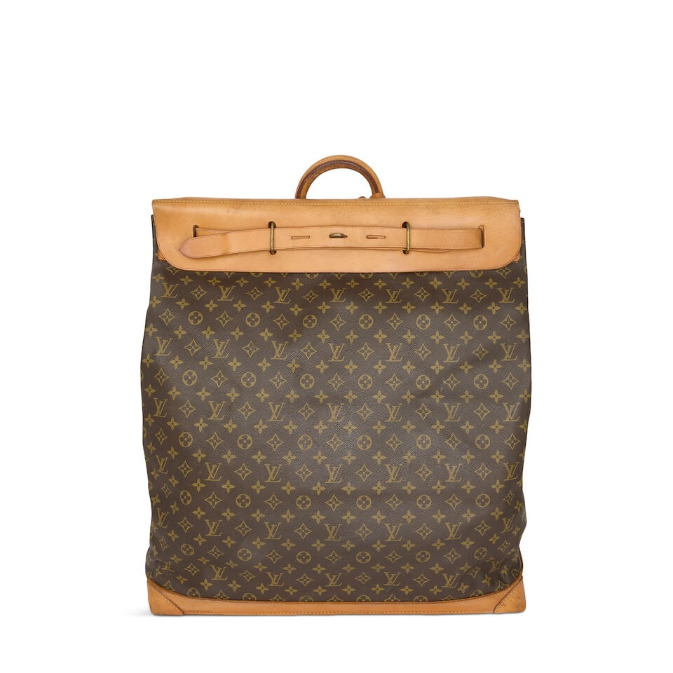 Louis Vuitton: a Monogram Steamer Bag 55 1982 (includes luggage tag): Louis Vuitton: a Monogram Steamer Bag 55 1982 Monogram canvas with Vachetta leather trim and brass hardware Condition Grade C+ 55cm wide, 55cm high, 26cm deep, includes luggage tag For further informa