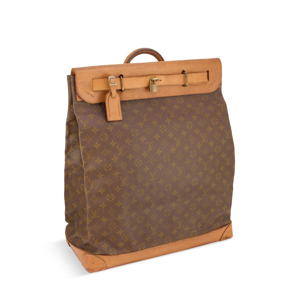 Louis Vuitton: a Monogram Steamer Bag 45 1970/80s (includes padlock, key and luggage tag): Louis Vuitton: a Monogram Steamer Bag 45 Monogram canvas with Vachetta trim, brass hardware Condition Grade C 45cm wide, 53cm high, 21cm deep, includes padlock, key and luggage tag For further informa