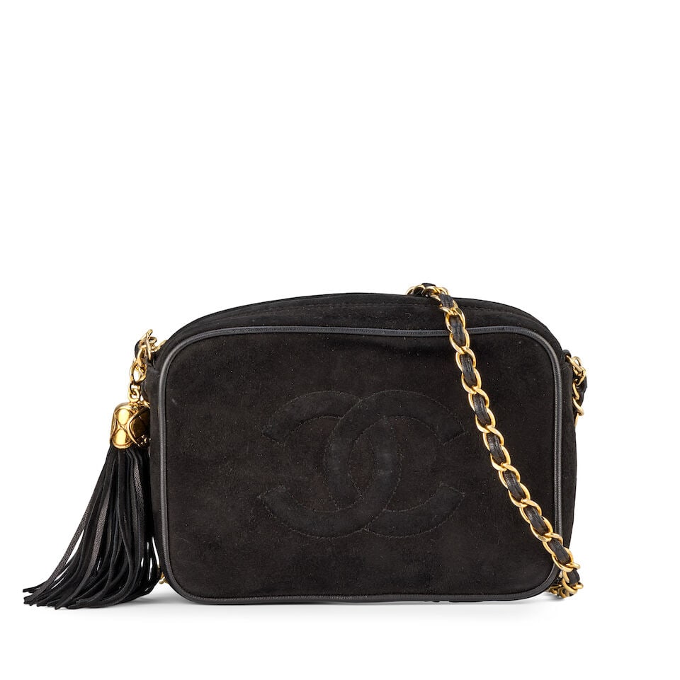 Chanel: a Black Suede Tassel Camera Bag 1989-91 (includes serial sticker, authenticity card and ... (1 of 2)
