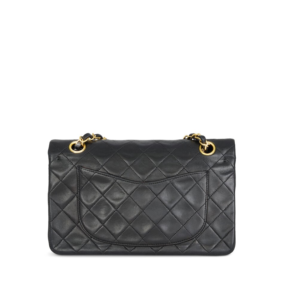 Chanel: a Black Lambskin Small Classic Double Flap Bag 1996-97 (includes serial sticker, authent... - 2