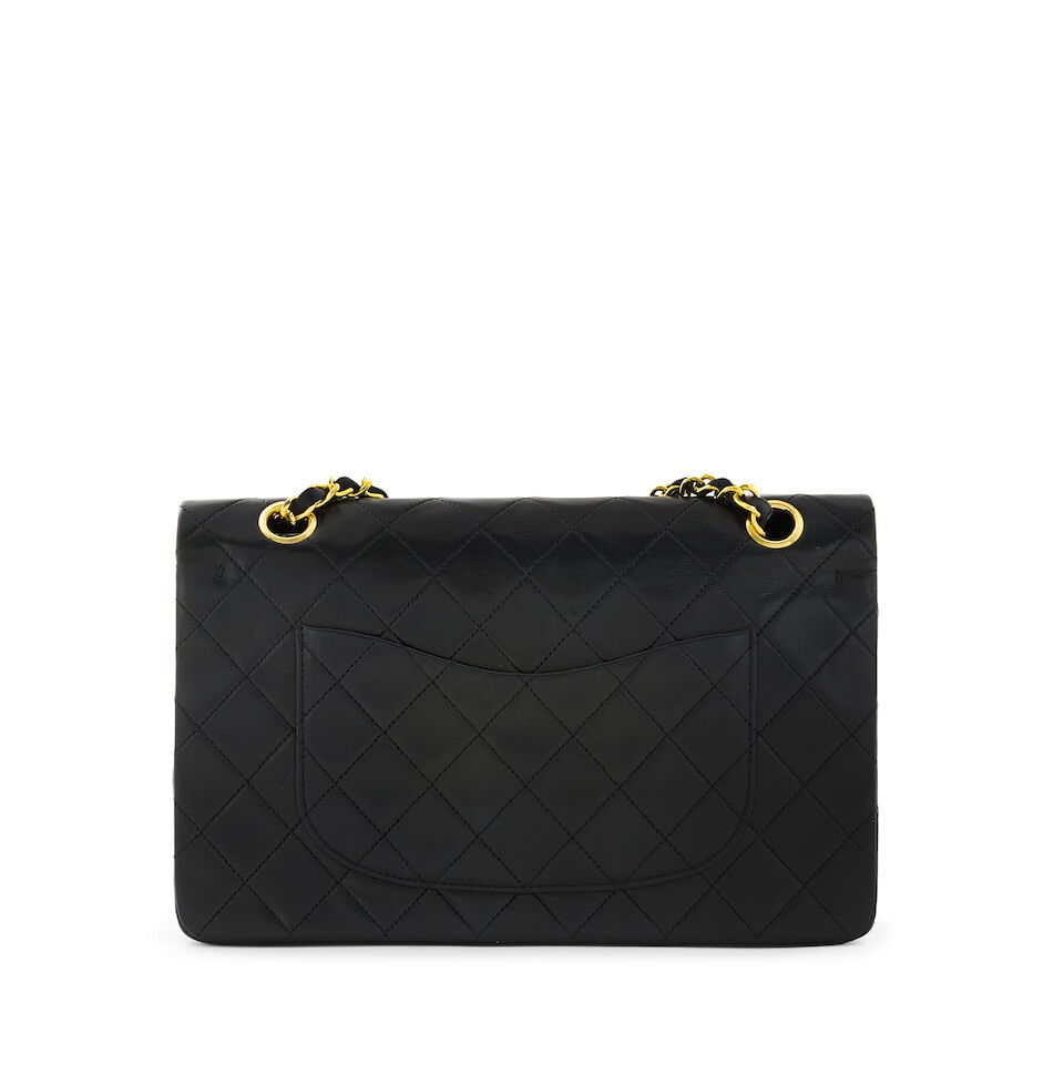 Chanel: a Black Lambskin Medium Classic Double Flap Bag 1989-91 (includes serial sticker, authen... - 2