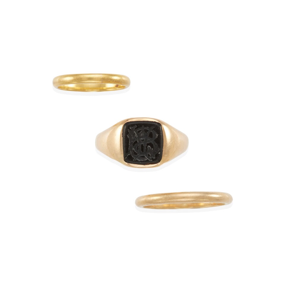 GROUP OF VINTAGE GOLD RINGS: GROUP OF VINTAGE GOLD RINGS • One ring of 14k yellow gold with carved onyx element, size 10 1/2, estimated weight 6.7 grams • One band of 14k yellow gold, size 10, estimated weight 3.4