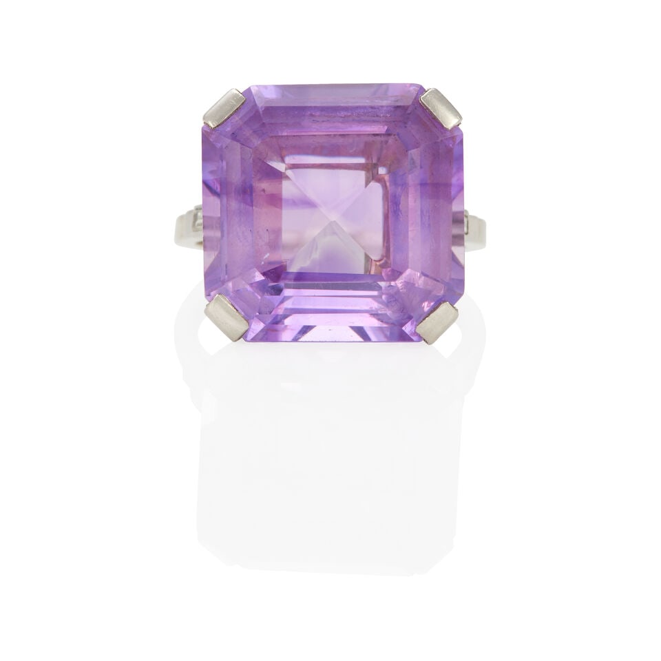 VINTAGE 14K GOLD, AMETHYST AND DIAMOND RING: VINTAGE 14K GOLD, AMETHYST AND DIAMOND RING • 14k white gold • 1 square amethyst weighing approximately 11.50 - 11.60 carats • 2 baguette diamonds weighing approximately 0.05 - 0.15