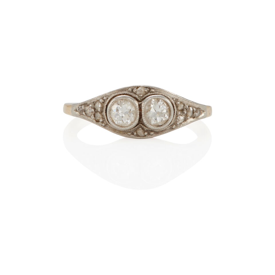 ANTIQUE PLATINUM TOPPED GOLD AND DIAMOND RING: ANTIQUE PLATINUM TOPPED GOLD AND DIAMOND RING • 14k yellow gold, platinum topped • Numerous rose-cut diamonds • 2 round diamonds weighing approximately 0.25 - 0.30 carats total ̶
