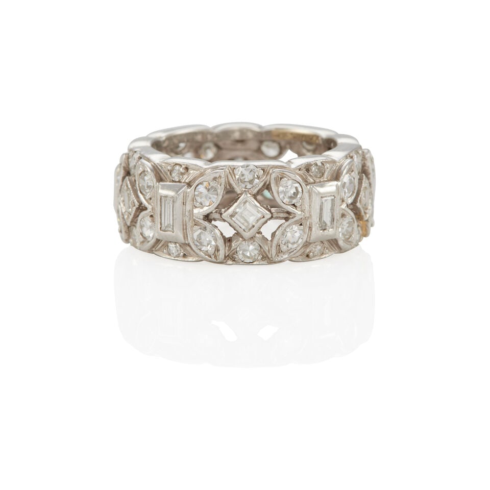 ART DECO PLATINUM AND DIAMOND RING: ART DECO PLATINUM AND DIAMOND RING • Platinum • Various round and baguette shaped diamonds weighing approximately 1.60 - 1.70 carat total • Size 5 3/4 • Estimated gross