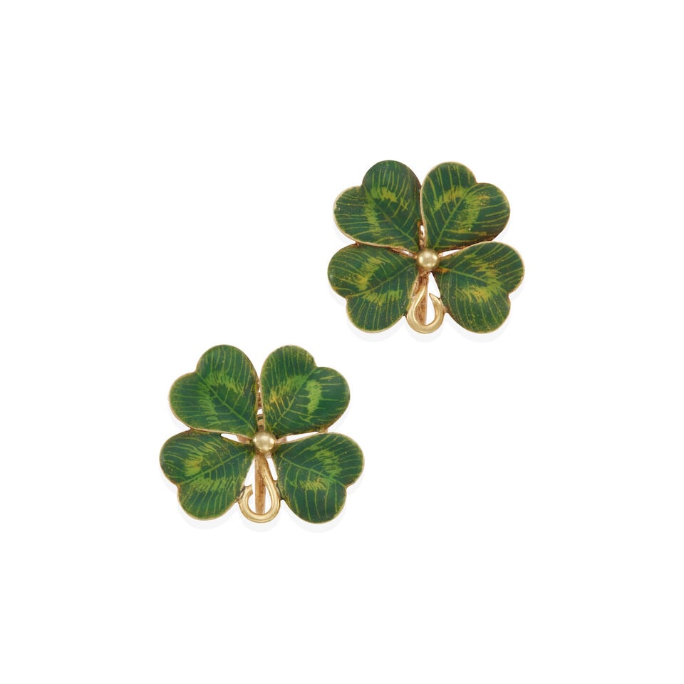ART NOUVEAU 14K GOLD AND ENAMEL EARCLIPS: ART NOUVEAU 14K GOLD AND ENAMEL EARCLIPS • 14k yellow gold • Enamel in green and yellow • Dimensions 3/4 x 13/16 in • Estimated gross weight: 6.3 grams Footnotes: Overall