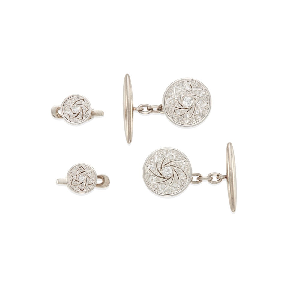 ANTIQUE 18K GOLD AND DIAMOND CUFFLINKS AND STUD SET: ANTIQUE 18K GOLD AND DIAMOND CUFFLINKS AND STUD SET •18k white gold cufflinks with numerous round, round rose, and round single diamonds weighing approximately 0.35 - 0.45 carats total, diameter