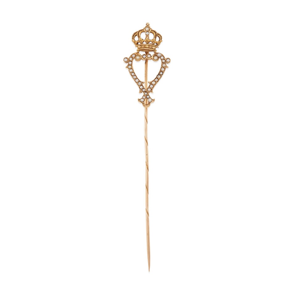 ANTIQUE GOLD AND CULTURED PEARL STICK PIN: ANTIQUE GOLD AND CULTURED PEARL STICK PIN • 20k yellow gold and 14k rose gold • Numerous round cultured pearls, measuring approximately 1.15 to 1.85 mm • Measures 3 3/4 x 11/16