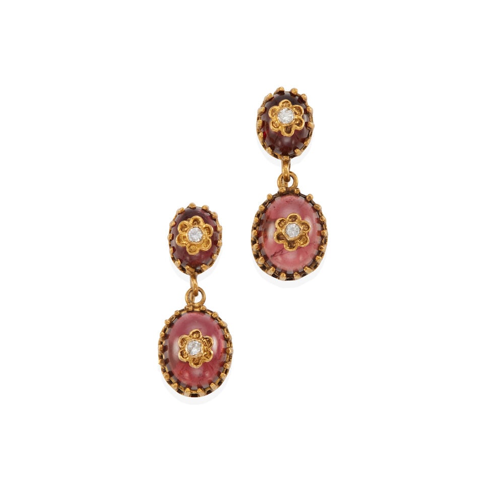 PAIR OF ANTIQUE 14K GOLD, GARNET AND DIAMOND EARCLIPS: PAIR OF ANTIQUE 14K GOLD, GARNET AND DIAMOND EARCLIPS • 14k yellow gold • 4 round diamonds weighing approximately 0.05- 0.15 carat total • 4 oval drilled garnet cabochons • Mea