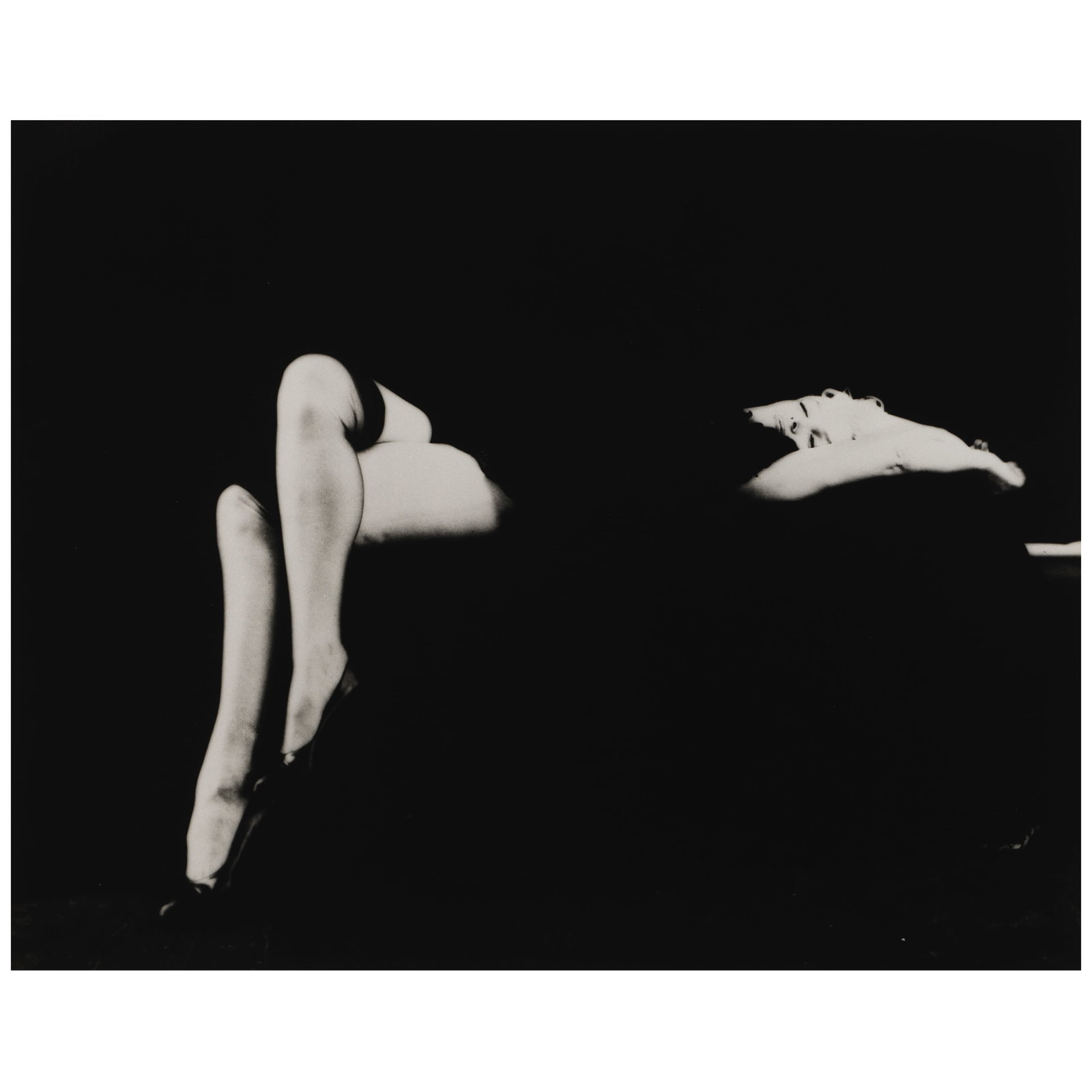 Milton H. Greene (1922-1985); Marilyn Monroe Reclining (from the Black Sitting);: Milton H. Greene (1922-1985) Marilyn Monroe Reclining (from the Black Sitting), 1956 Gelatin silver print, printed later; the photographer's copyright/reproduction rights stamp, signed and editioned '