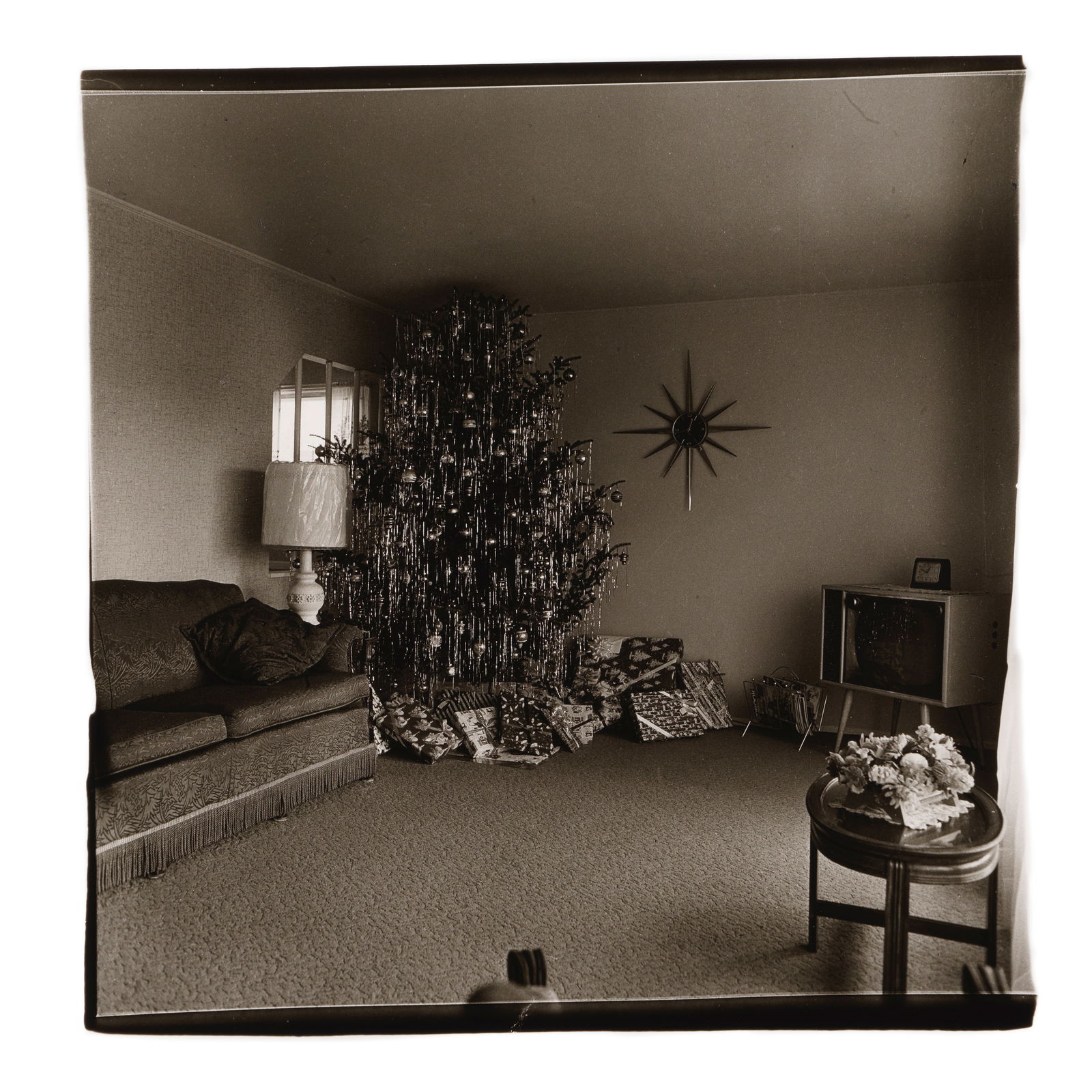 Diane Arbus (1923-1971); 'Parlor, Xmas, Levittown' (Xmas tree in a living room in Levittown, L.I.);: Diane Arbus (1923-1971) 'Parlor, Xmas, Levittown' (Xmas tree in a living room in Levittown, L.I.), 1962 Gelatin silver print, probably printed between 1965 and 1970; signed, titled, and dated in penci