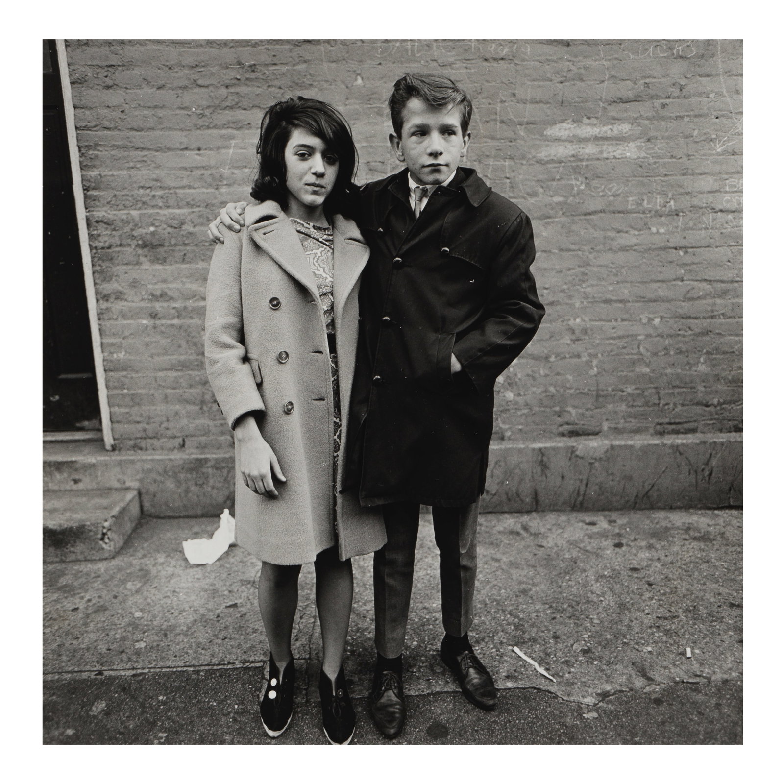 Diane Arbus (1923-1971); 'Courtship, Teenage Couple, Hudson St.';: Diane Arbus (1923-1971) 'Courtship, Teenage Couple, Hudson St.', 1963 Gelatin silver print, printed between 1963 and 1967; signed, titled, and dated, and with the Estate of Diane Arbus reference numbe