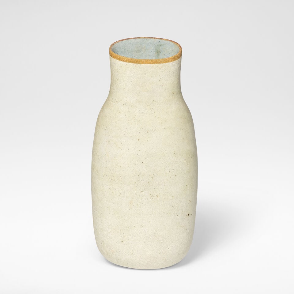 Elizabeth Fritsch 'Speckled Vase', 1978: Elizabeth Fritsch 'Speckled Vase', 1978 Stoneware, mottled white speckled glaze over a softly pitted body. The rim with an ochre and brown band and the interior with a soft blue glaze. 26.2 cm high, 1