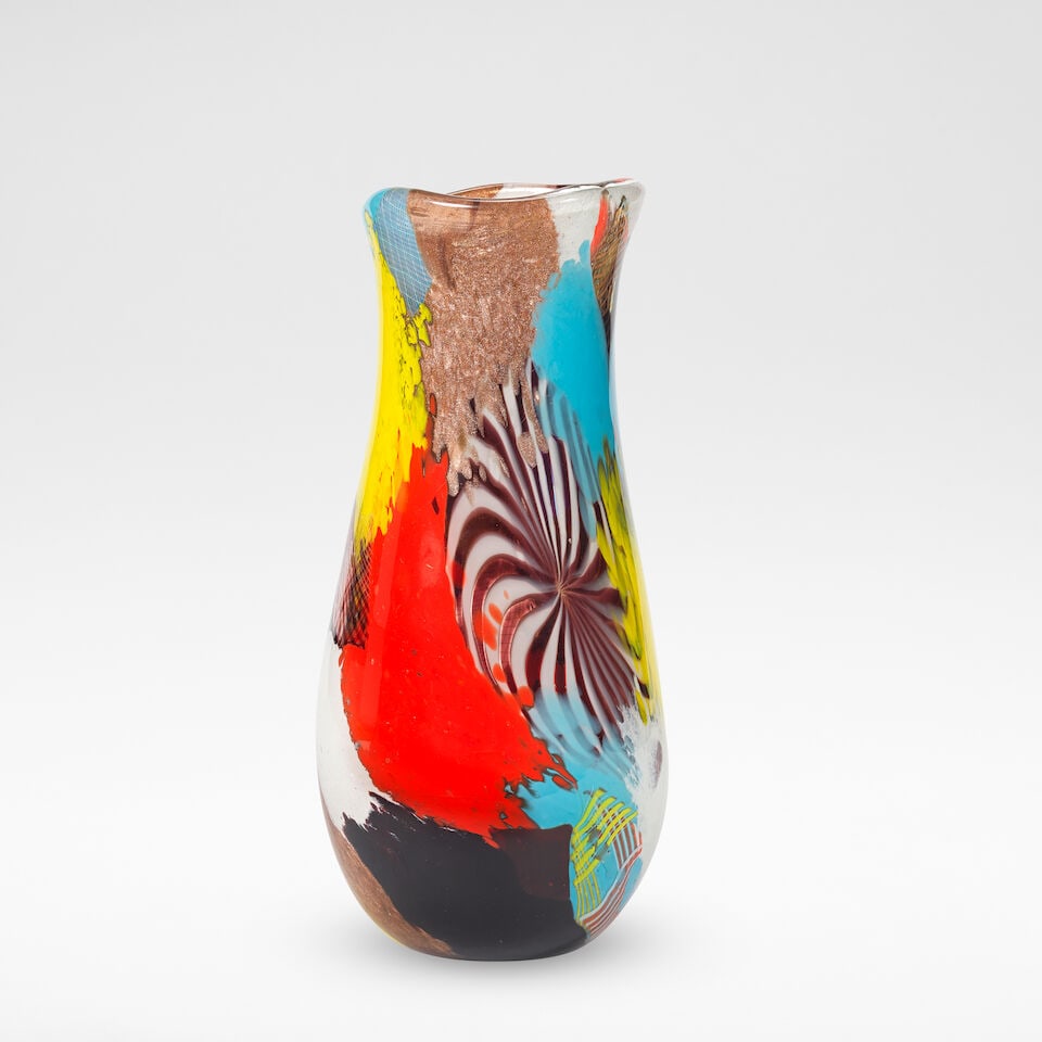 Dino Martens 'Oriente' vase, model no. 3124, designed circa 1952: Dino Martens 'Oriente' vase, model no. 3124, designed circa 1952 Cased glass, with powder inclusions of red, white, yellow, light blue, deep violet and aventurine, Filigrana technique, with a spiralle