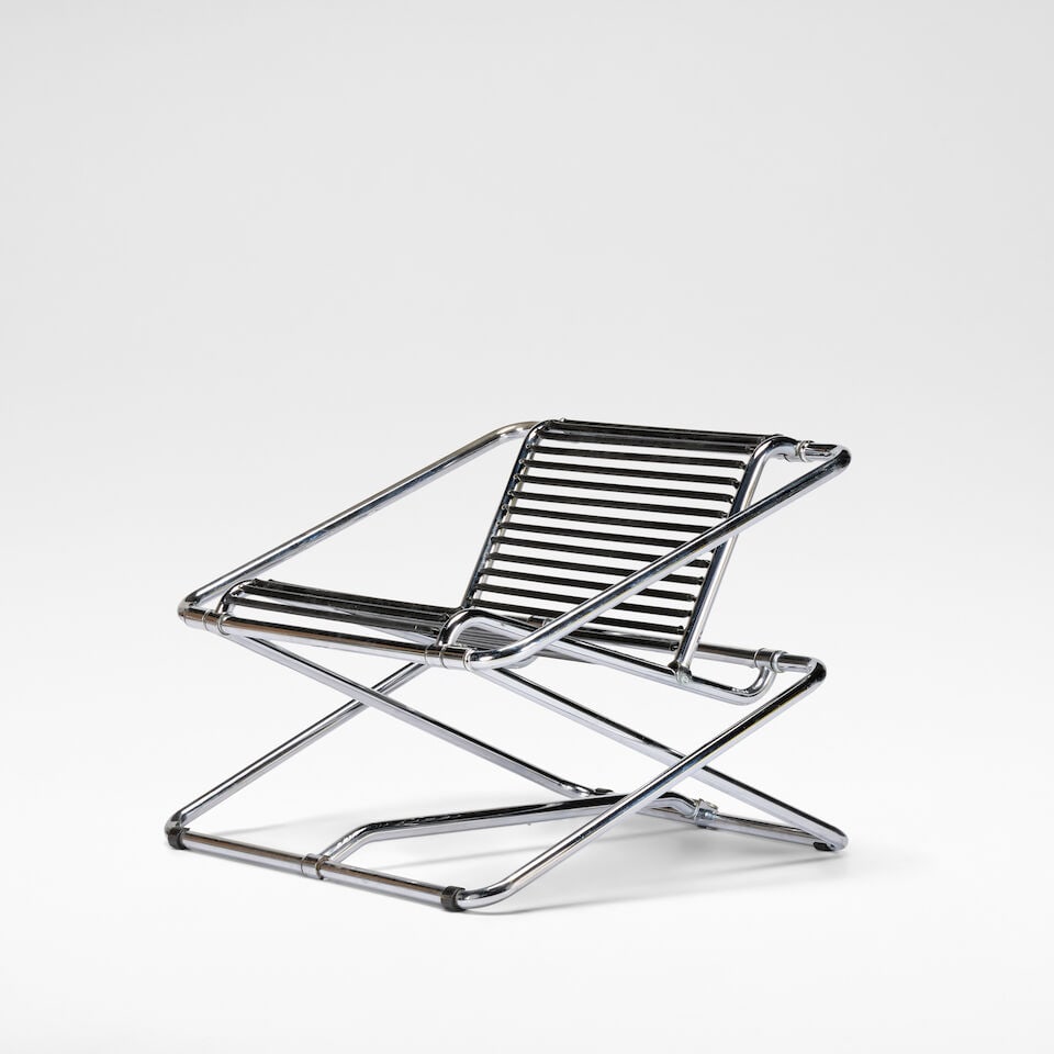 Ron Arad 'Rocking Chair', designed 1981, manufactured circa 1986: Ron Arad 'Rocking Chair', designed 1981, manufactured circa 1986 Chromed plated tubular steel, the back and seat with horizontal PVC coated springs. 63 cm high, 79 cm wide, 75 cm deep Manufactured by 