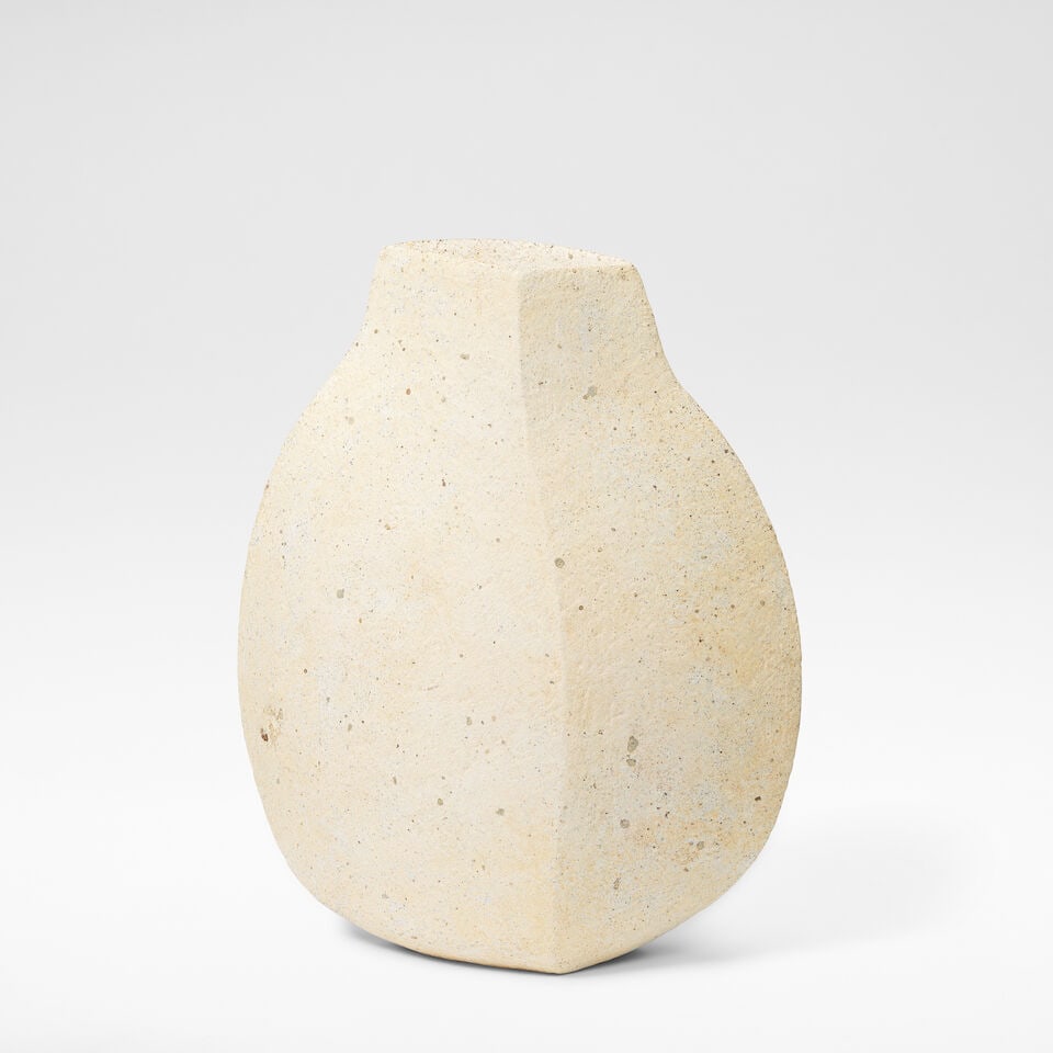 Paul Philp Tall flattened vessel: Paul Philp Tall flattened vessel Stoneware, dry mottled cream and brown glazes over a textured body, with a soft brown speckle. 64.5 cm high, 56 cm wide, 15 cm deep Underside impressed with artist's