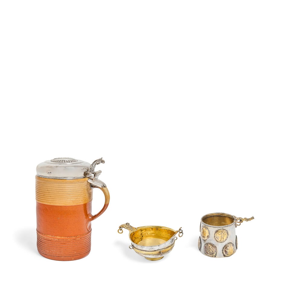A Norwegian silver-mounted stoneware tankard Romanus Andersen Pharo, Oslo, 1746, guardeinstempl...: A Norwegian silver-mounted stoneware tankard Romanus Andersen Pharo, Oslo, 1746, guardeinstempler mark for Jacon Anderson Møller, The silver domed cover centred with an inset gilt coin of Christi