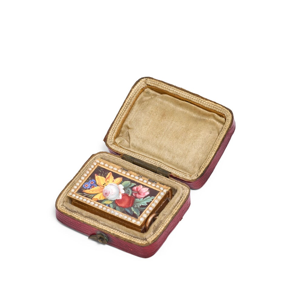 A 19th century Swiss gold, enamel and pearl set novelty 'book' vinaigrette George Remond et Cie...: A 19th century Swiss gold, enamel and pearl set novelty 'book' vinaigrette George Remond et Cie, Geneva, circa 1804-1815 The 'cover' painted with a spray of summer flowers within a split pearl border,