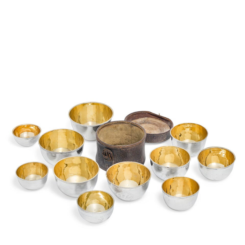 Eleven graduated continental parcel-gilt silver tumbler-cups some with marks, possibly maker's m... (1 of 2)