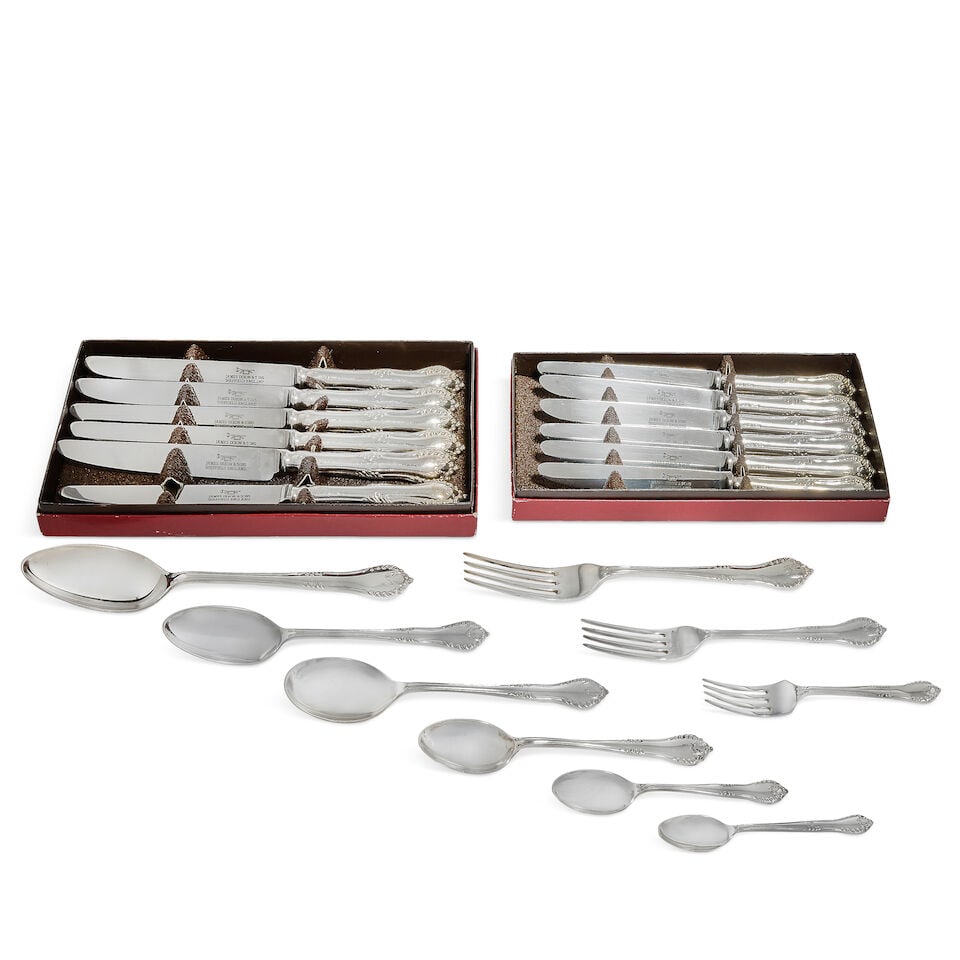 A modern silver table service of flatware and cutlery James Dixon & Sons Ltd, Sheffield 1970 / 1...: A modern silver table service of flatware and cutlery James Dixon & Sons Ltd, Sheffield 1970 / 1971 and 1988 / 1989 King's shape with scrolls and gadroon, with anthemion heel, comprising: twenty-four 