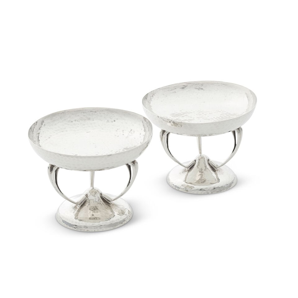 A pair of Scottish Arts and Crafts silver tazzas James Weir, Glasgow 1909: A pair of Scottish Arts and Crafts silver tazzas James Weir, Glasgow 1909 Each with circular bowls, with a hammered surface, raised on three curved arms, on a conical foot, with a hammered surface, he