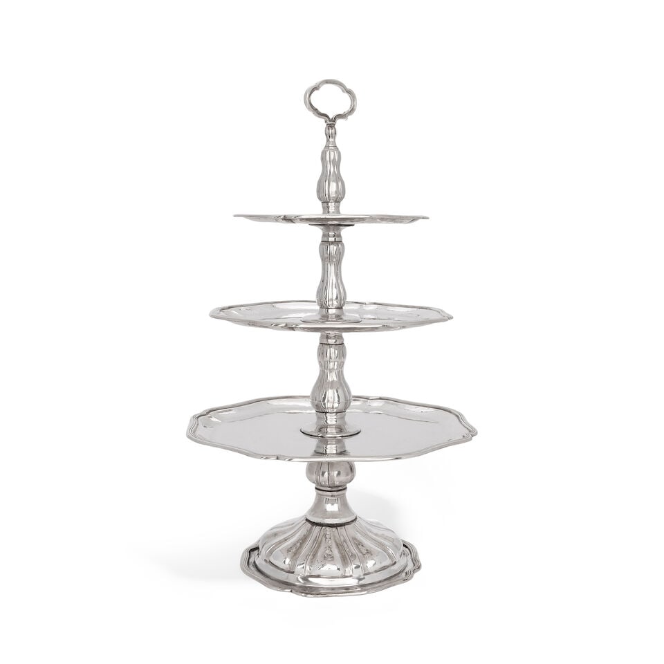 A Spanish large silver cake stand pentagram mark, marks also MG, and maker's mark LO, fish devic...: A Spanish large silver cake stand pentagram mark, marks also MG, and maker's mark LO, fish device for Platería López, Madrid, 20th century The three graduated shaped-circular tiers with moul