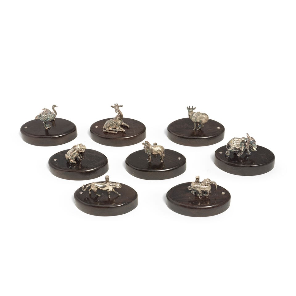 PATRICK MAVROS: a collection of eight silver animal sculpture place holders Patrick Mavros, Zimb... (1 of 1)