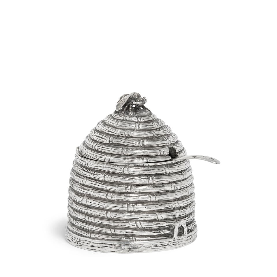 THEO FENNELL: a silver honey pot 'skep' London 1994, underside also engraved FENNELL: THEO FENNELL: a silver honey pot 'skep' London 1994, underside also engraved FENNELL Realistically cast and chased as a bee-skep, the hinged cover with applied gilt bee, with unmarked spoon, height 6.