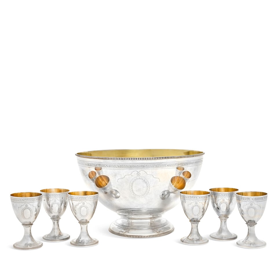 A modern silver punch bowl and six beakers C J Vander Ltd, London 1973 (7): A modern silver punch bowl and six beakers C J Vander Ltd, London 1973 In the 18th century manner with bead rims and bright and prick-dot engraved bands, bowl of hemispherical form on a spreading circ