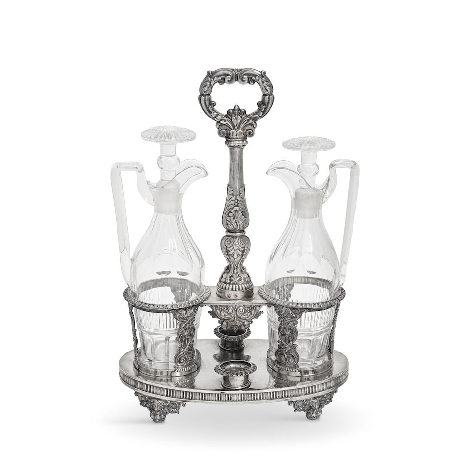A 19th century French silver oil and vinegar / condiment set Alexandre Thierry, Paris 1819 - 1838: A 19th century French silver oil and vinegar / condiment set Alexandre Thierry, Paris 1819 - 1838 The oval base fitted with two open-work receivers, circular each with three acanthus scroll supports, 