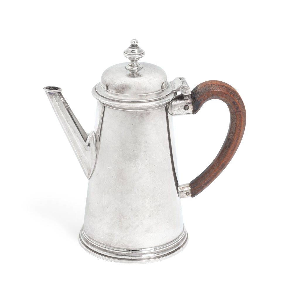 A George II diminutive silver coffee / saffron pot Augustine Courtauld I, London 1734: A George II diminutive silver coffee / saffron pot Augustine Courtauld I, London 1734 Plain tapering cylindrical side, hinged dome cover with disc-knop finial, on a moulded skirted foot, faceted angul