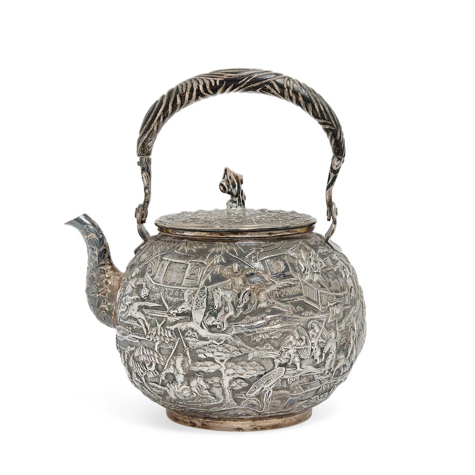 A Chinese export silver teapot with artisans mark for Quan Ji and retail mark for Lee Ching (1 of 7)
