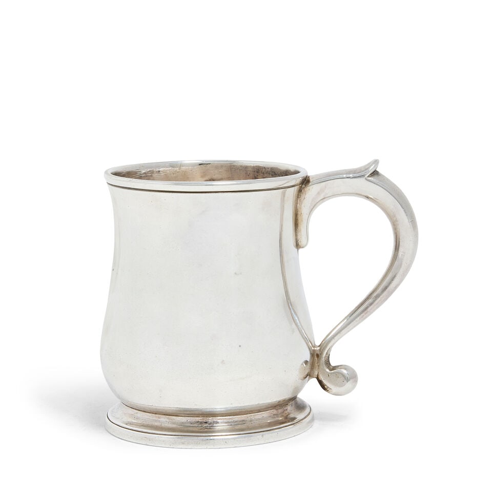 A George II silver mug Paul de Lamerie, London 1732: A George II silver mug Paul de Lamerie, London 1732 Plain baluster form, scroll handle, on a spreading circular foot, underside of base with engraved initials and date ME 1733, height 9.2cm, weight 9.