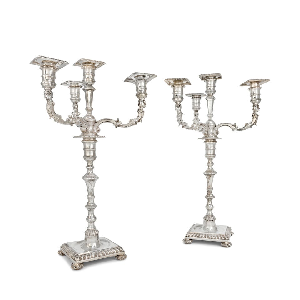 A pair of George III silver candlesticks with Victorian four-light candelabra branches Frederick... (1 of 2)