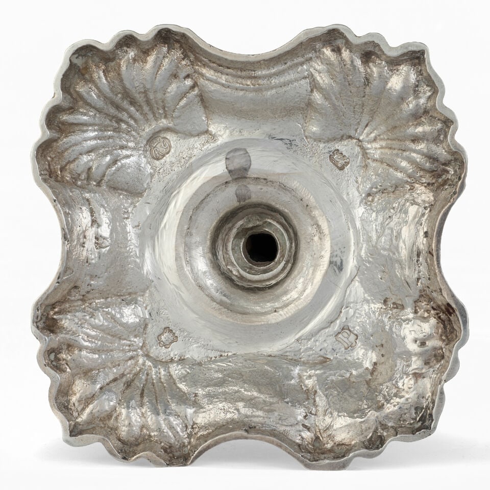 Four George II cast silver candlesticks Richard Gosling, London three 1749 one 1750 (4) - 2