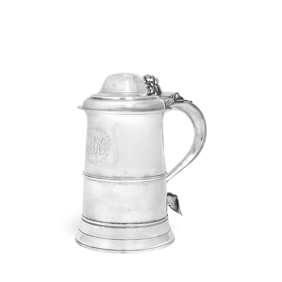 A George III silver tankard Samuel Godbehere, Edward Wigan & James Boult, London 1802: A George III silver tankard Samuel Godbehere, Edward Wigan & James Boult, London 1802 Slightly tapering form with an applied girdle and skirted foot, with engraved initials within a laurel garland, th