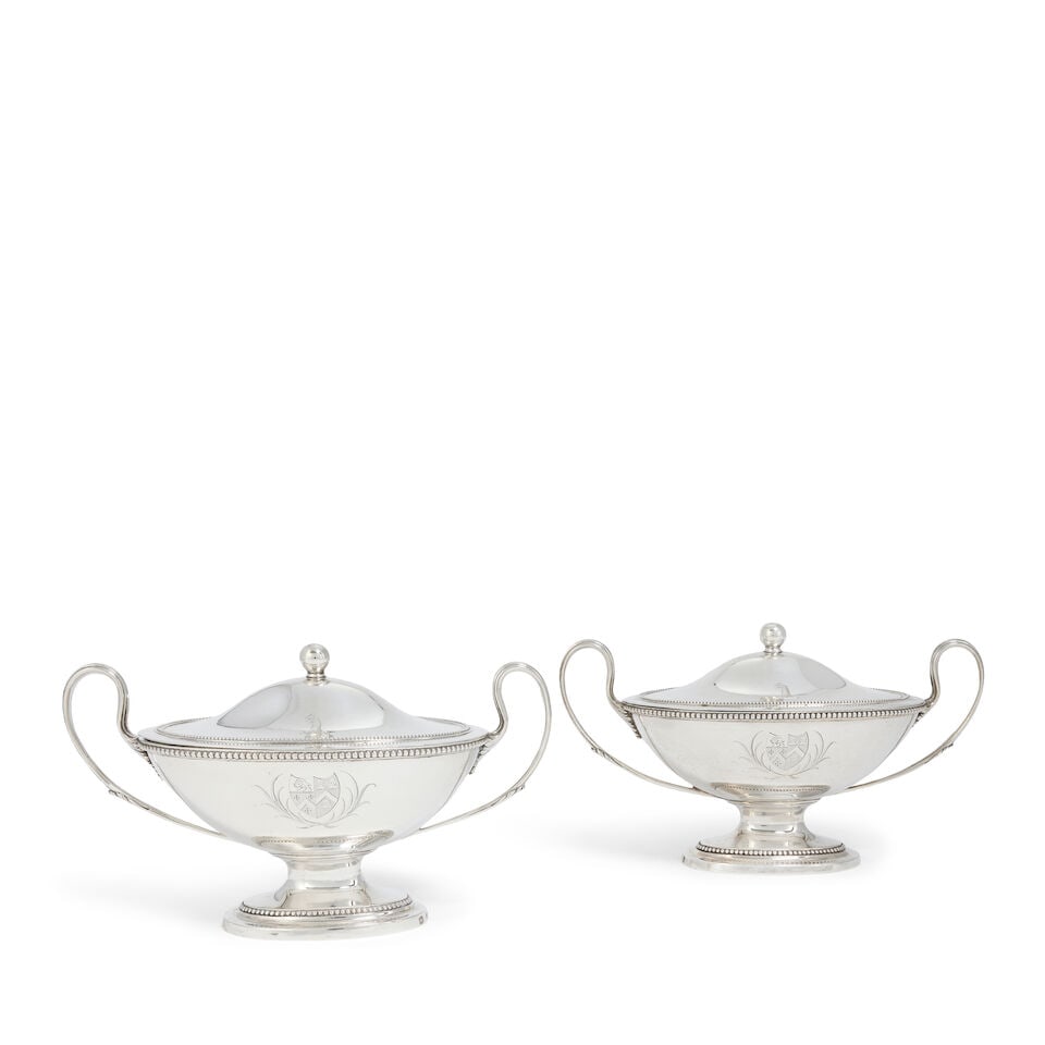 Two George III silver sauce tureens Daniel Smith and Robert Sharpe, London 1782 and 1783: Two George III silver sauce tureens Daniel Smith and Robert Sharpe, London 1782 and 1783 Oval form on pedestal foot, with beaded rims, with two upright reeded looped handles, with domed cover with bal