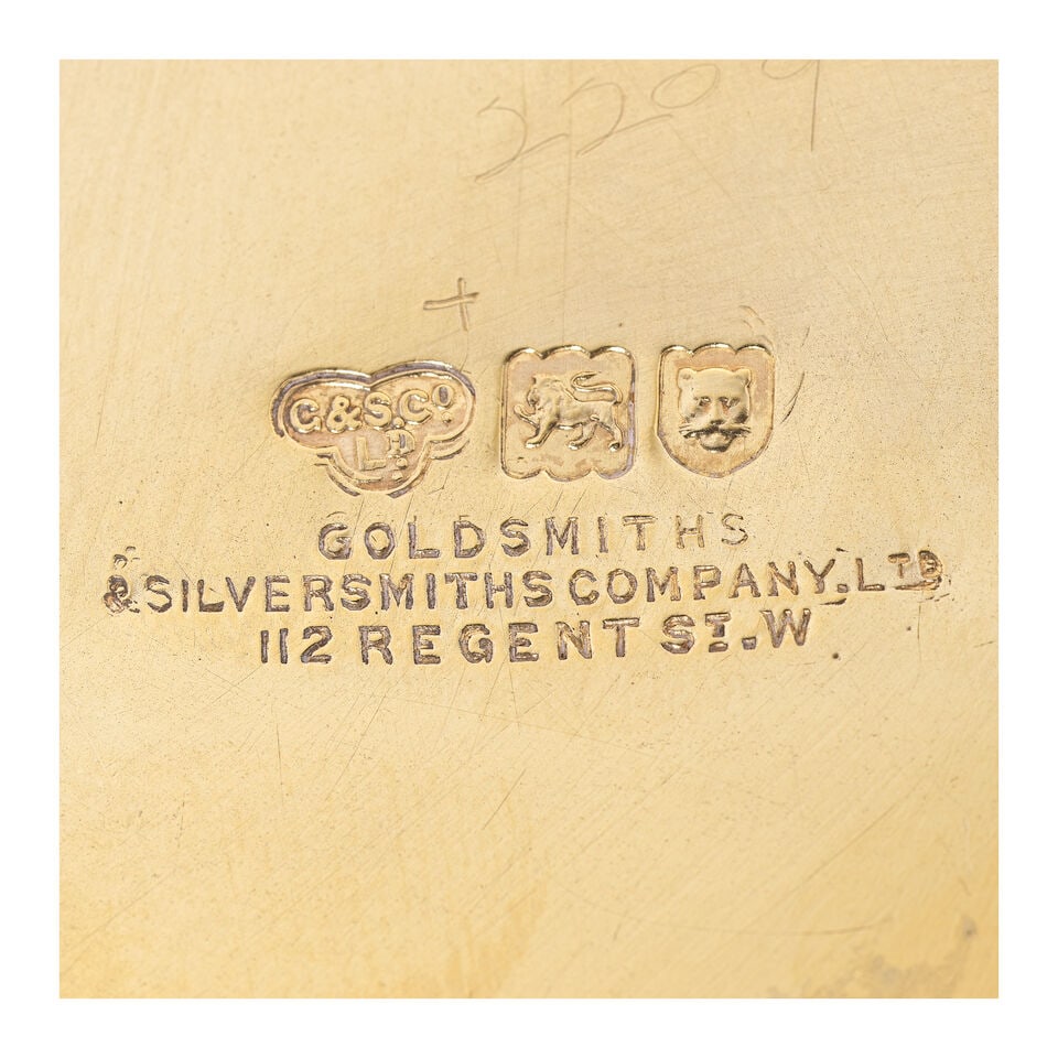 An Edwardian silver-gilt mounted glass decanter Goldsmiths & Silversmiths Co Ltd, London 1903 - 2