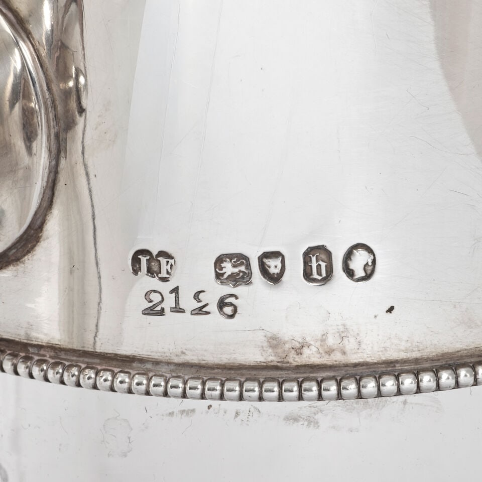 A near pair of Victorian silver-mounted glass claret jugs John Figg, London 1857 and 1860, also ... - 2