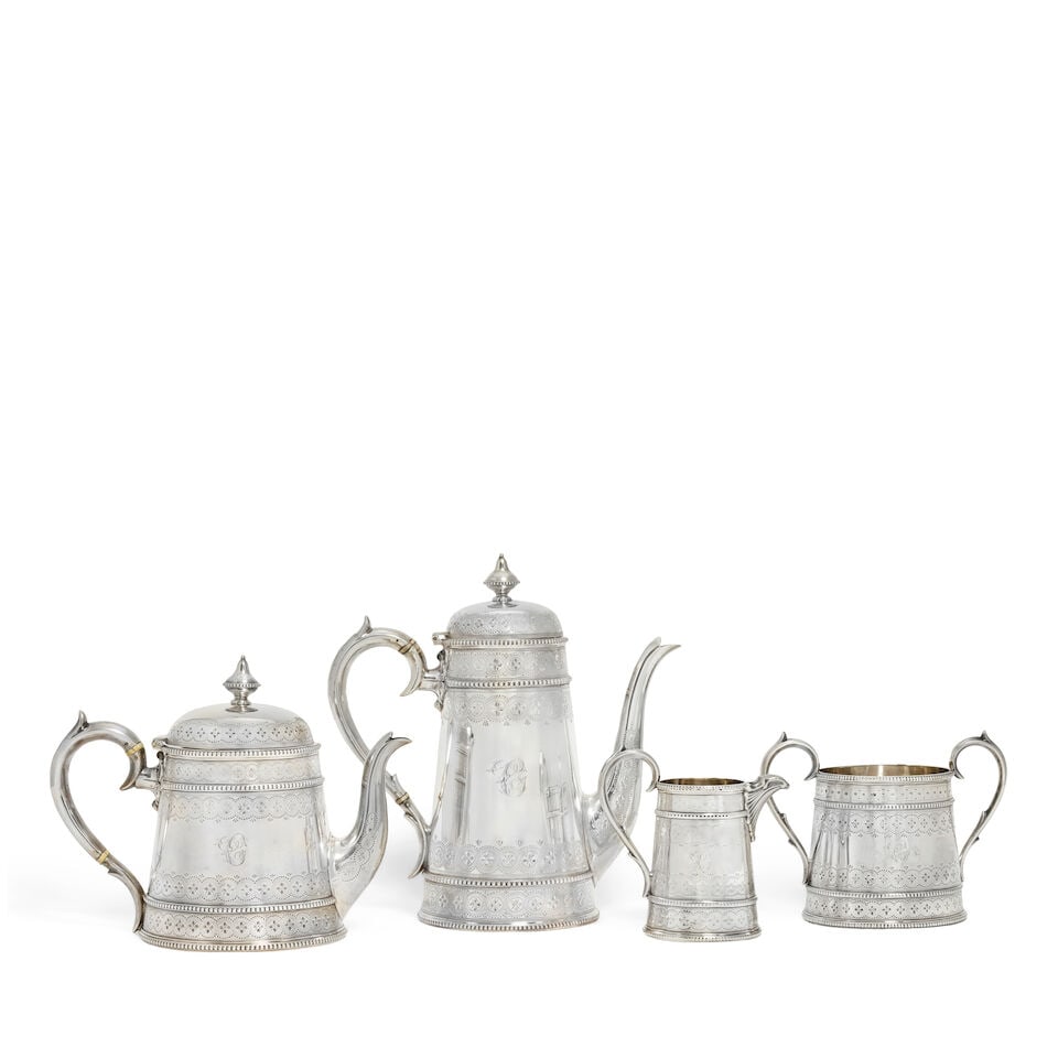 A matched Victorian four-piece silver tea service Thomas Bradbury & Sons Ltd, London 1883 and 18...: A matched Victorian four-piece silver tea service Thomas Bradbury & Sons Ltd, London 1883 and 1885 Tapering flat sided form, each with beaded girdles to the upper and lower sections, each with chased 