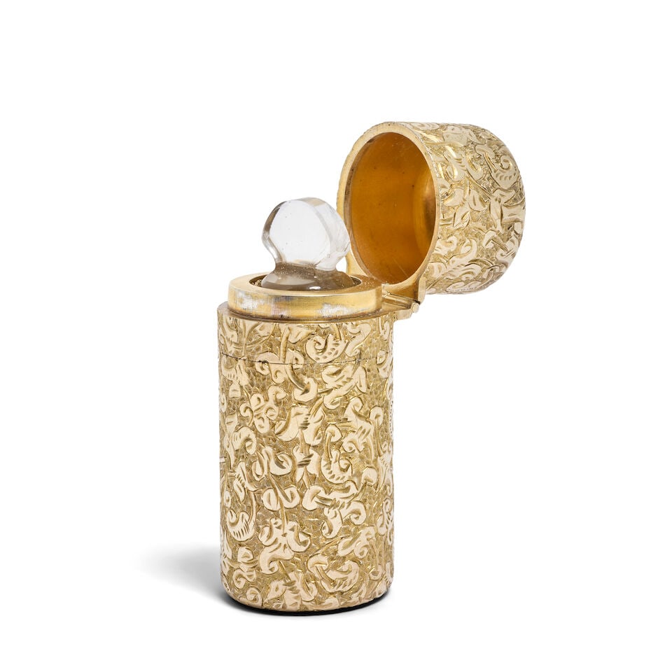 A Victorian silver-gilt scent bottle Sampson Mordan & Co, London 1881 - 2