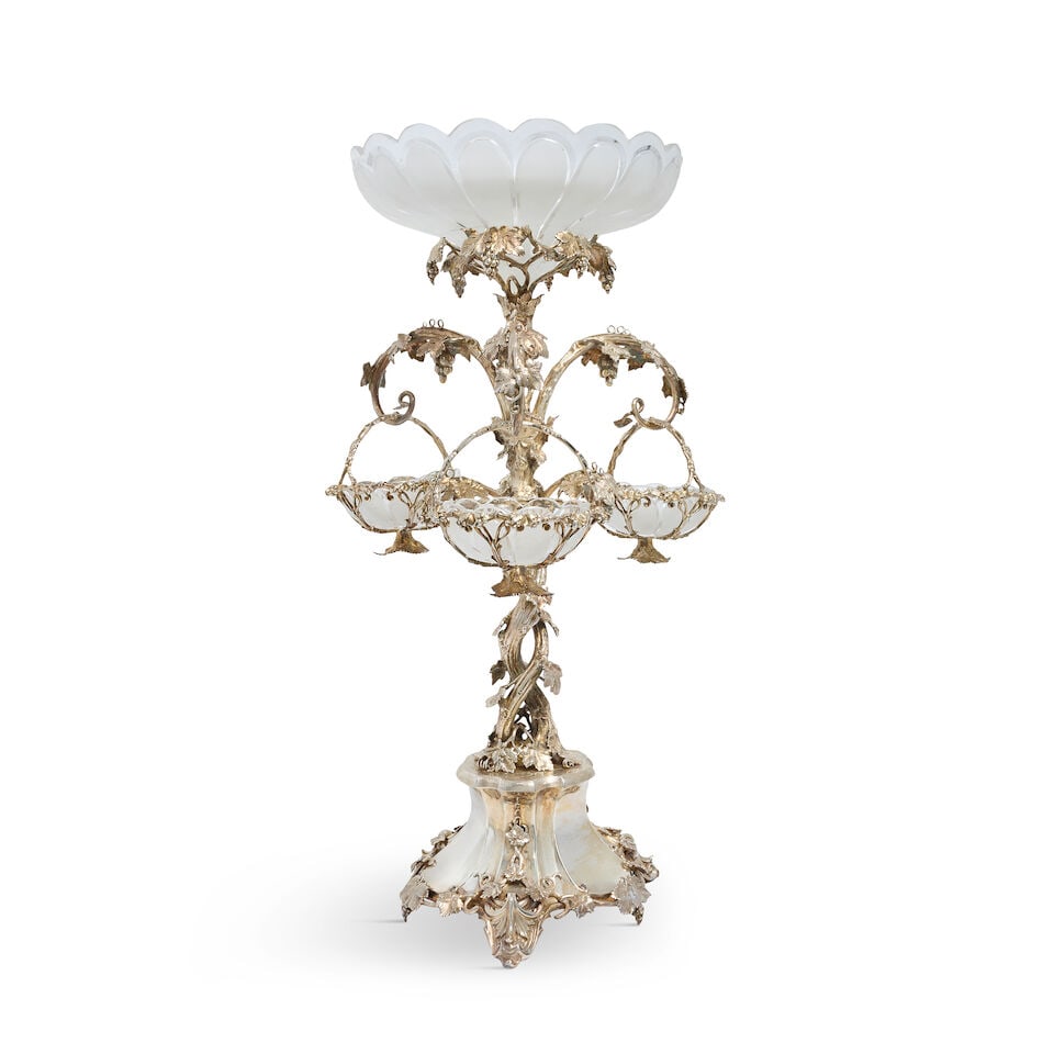 A Victorian electroplated centrepiece Thomas Bradbury & Sons, 1859: A Victorian electroplated centrepiece Thomas Bradbury & Sons, 1859 With cut glass frosted bowl, supported on naturalistically modelled fruit vine support, with three scrolling naturalistically modelle