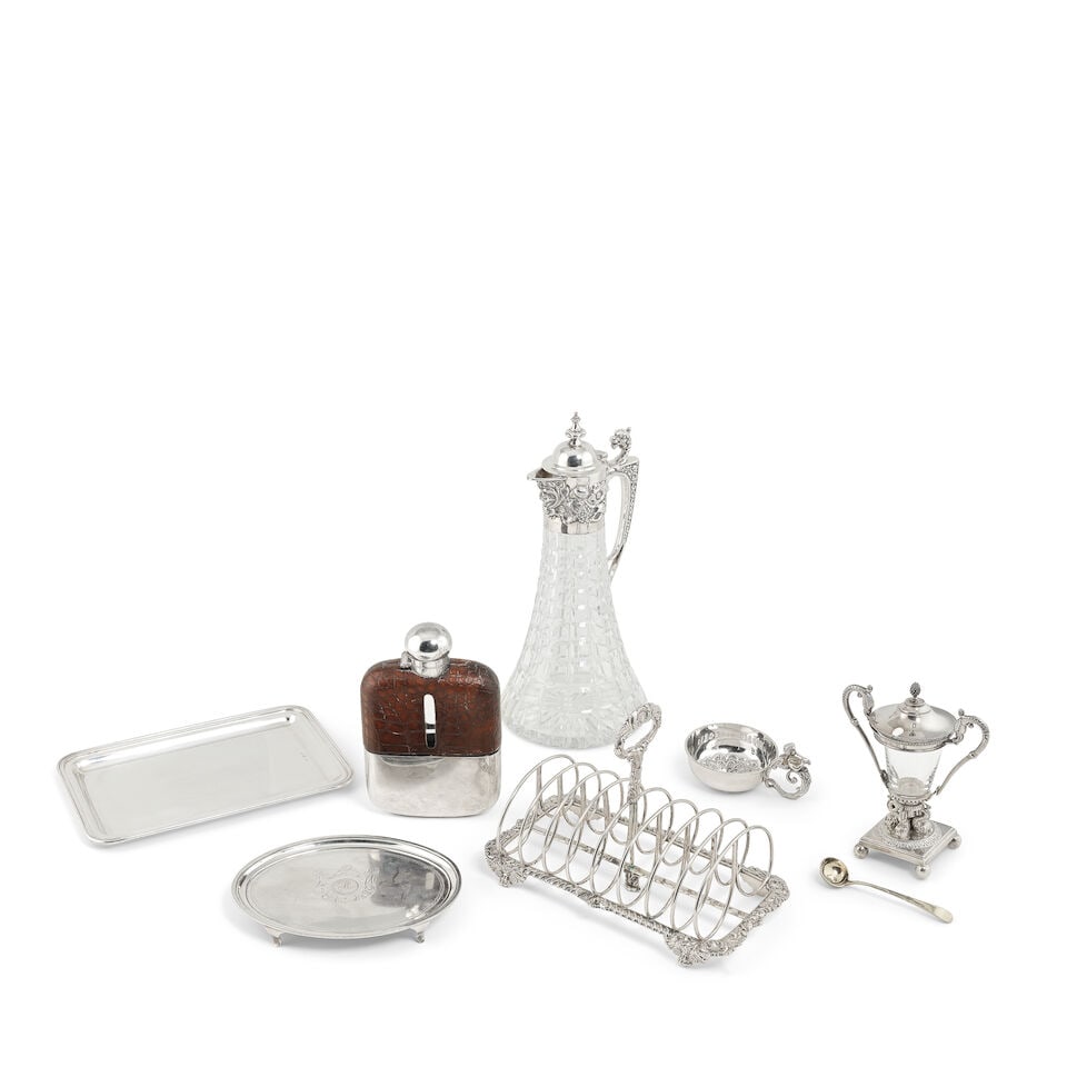 A group of silver and electroplate (7): A group of silver and electroplate Comprising: A George III silver tray, Solomon Hougham London 1796, oval form with engraved initial within mantling, raised on foot feet; A George IV silver toast rac