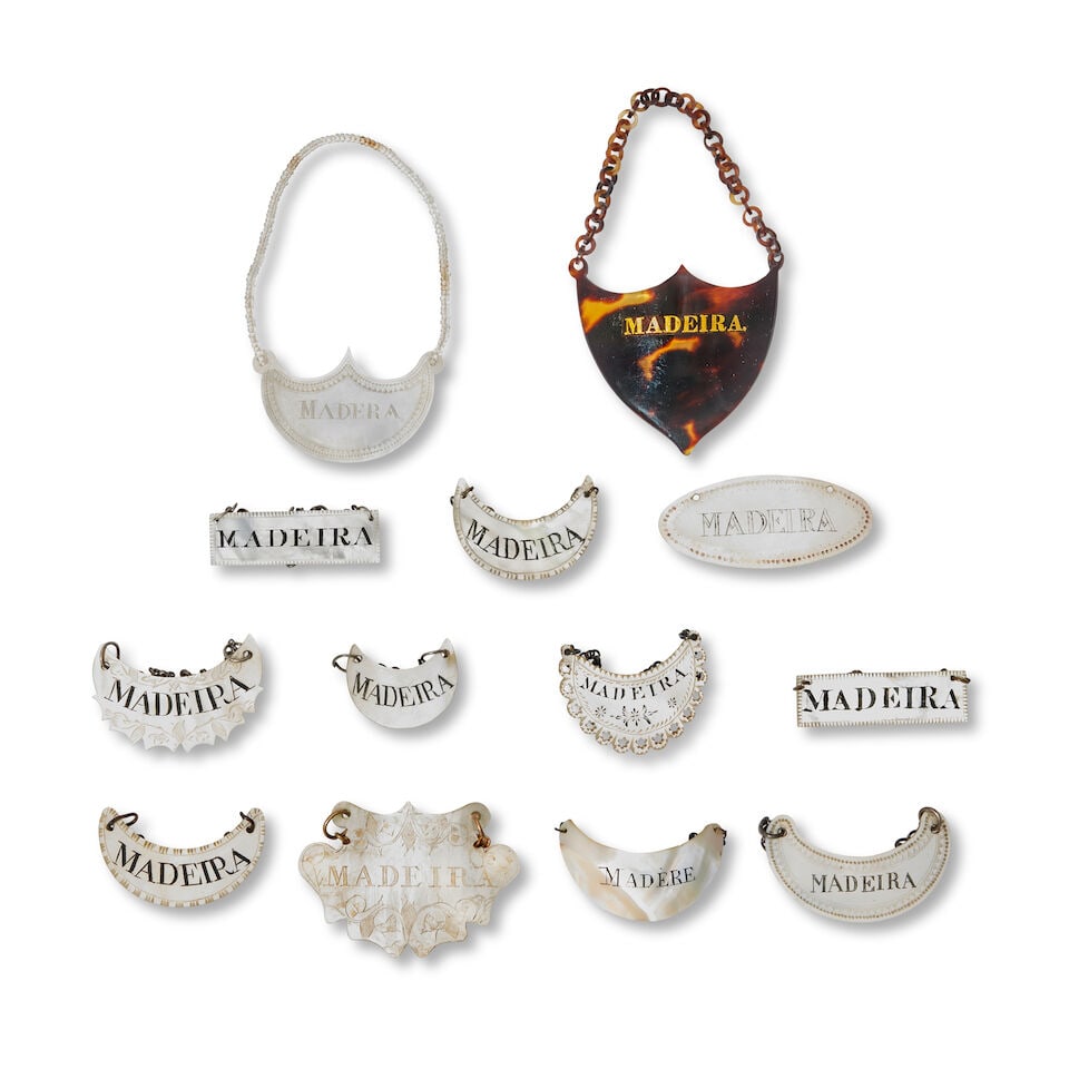 A collection of twelve mother of pearl MADEIRA labels, and a tortoiseshell MADEIRA label (13) (1 of 1)